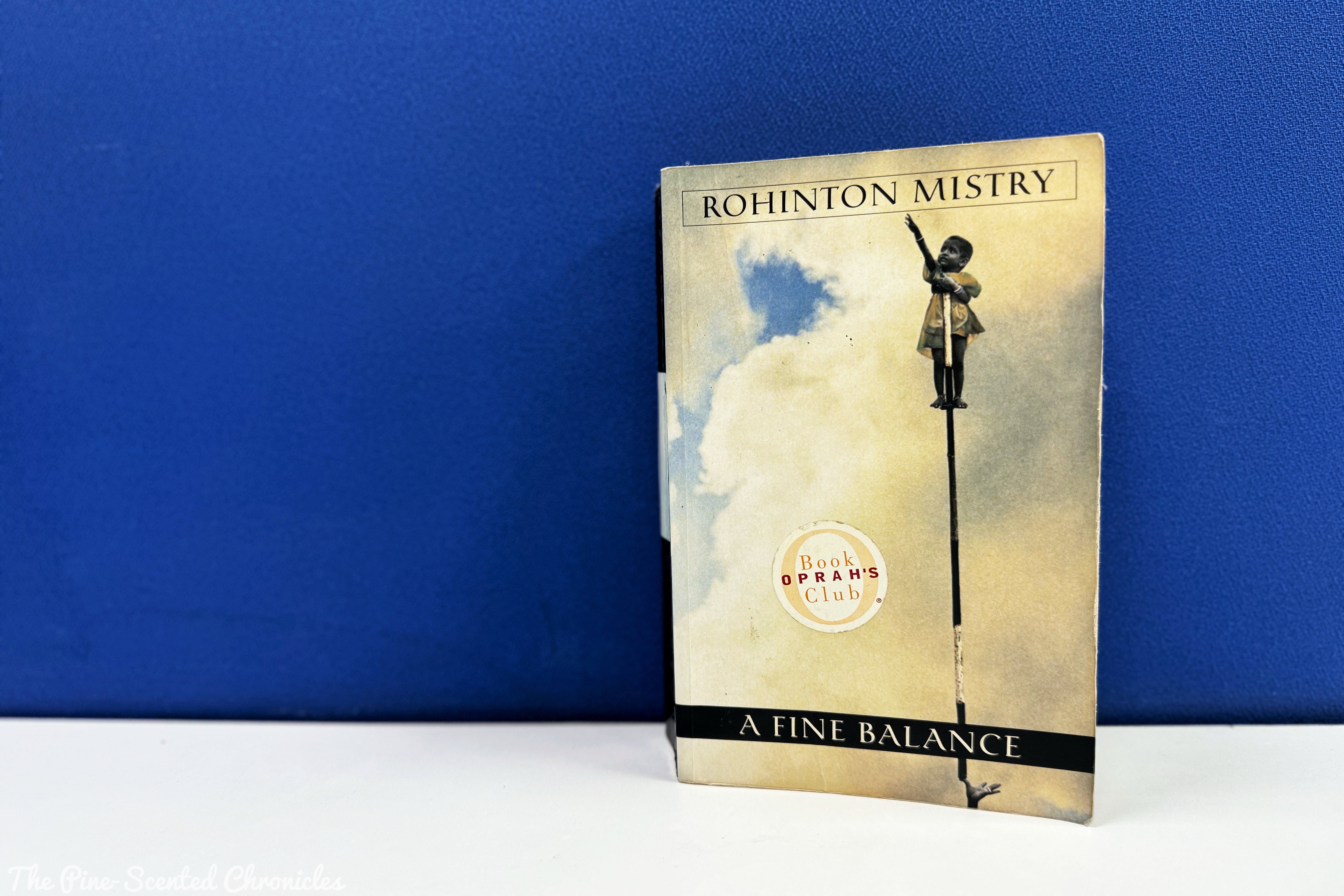 Book Review # 555: A Fine Balance – The Pine-Scented Chronicles